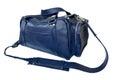 Blue traveling bag with a removable shoulder strap, it is isolated on a white background Royalty Free Stock Photo