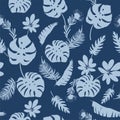 Blue tropical leaves, plants, flowers on dark blue background Vector seamless pattern. Beautiful print with exotic Royalty Free Stock Photo