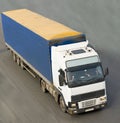 Blue truck view from top isolated on road