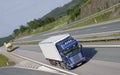Blue trucking on highway Royalty Free Stock Photo