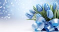 Blue tulips bouquet with ribbon bow on light background with bokeh. Banner with copy space. Ideal for poster, greeting Royalty Free Stock Photo