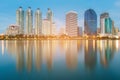 Blue twilight office building with water reflection Royalty Free Stock Photo