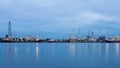 Blue twilight sky panorama oil refinery river front
