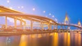 Blue twilight twin suspension bridge river front