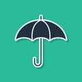 Blue Umbrella icon isolated on green background. Insurance concept. Waterproof icon. Protection, safety, security Royalty Free Stock Photo