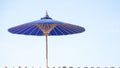 Blue umbrella made of mulberry paper with white Royalty Free Stock Photo