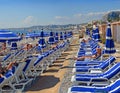 Blue Umbrellas on the Beach at Nice France Royalty Free Stock Photo