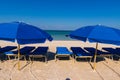 Blue Umbrellas on Marco Island Beach Royalty Free Stock Photo