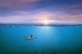 BLUE UNDER WATER waves and bubbles. Beautiful white clouds on blue sky over calm sea with sunlight reflection, Tranquil sea Royalty Free Stock Photo