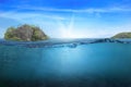 BLUE UNDER WATER waves and bubbles. Beautiful white clouds on blue sky over calm sea with sunlight reflection, Tranquil sea Royalty Free Stock Photo