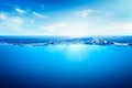 BLUE UNDER WATER waves and bubbles. Beautiful white clouds on blue sky over calm sea with sunlight reflection, Tranquil sea Royalty Free Stock Photo