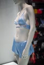 blue underwear on mannequin in fashion store showroom for women