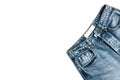 Blue unisex jeans flat lay isolated on white background with copy space. Everyday fashion clothes. Web, media template