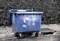 Blue urban tagged container. Degradation of public property.