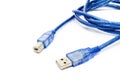 Blue USB cable with against the white background. Royalty Free Stock Photo