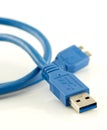 Blue usb 3.0 cable with micro B connector isolated on white Royalty Free Stock Photo