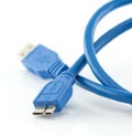 Blue usb 3.0 cable with micro B connector isolated on white Royalty Free Stock Photo