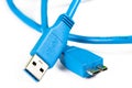 Blue usb 3.0 cable with micro B connector isolated on white background. Royalty Free Stock Photo