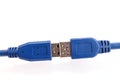Blue USB 3.0 power and data extension cable connectors isolated on white background. Closeup Royalty Free Stock Photo