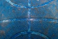 Blue, used, cracked basketball close up macro shot