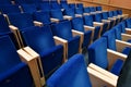 Blue velvet chairs in amphitheater Royalty Free Stock Photo