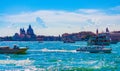 Blue Venice lagoon scenic view tour boats navigating Italy