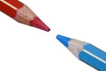 Blue versus Red Crayon Points Royalty Free Stock Photo