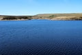 Blue view across Winscar Reservoir, near Dunford Bridge 2, Barnsley, South Yorkshire, England. Royalty Free Stock Photo