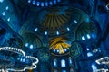 Blue view of interior of Hagia Sophia mosque dome with blue Muslim ornaments meaning Allah and Muhammed signs