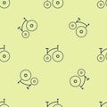 Blue Vintage bicycle with one big wheel and one small icon isolated seamless pattern on yellow background. Bike public Royalty Free Stock Photo