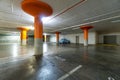 Blue vintage car parked on empty underground parking lot Royalty Free Stock Photo