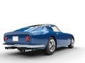 Blue vintage sports car - taillight view