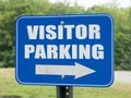 Blue visitor parking sign