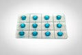 Blue vitamin capsule tablets isolated Royalty Free Stock Photo