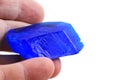 Blue vitriol mineral in human hand