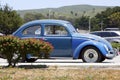 Blue Volkswagen Beetle side view. Old VW Beetle. Classic German car