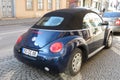 Blue Volkswagen New Beetle cabrio