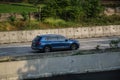 Blue Volkswagen Tiguan All Space driving fast on trans jawa highway