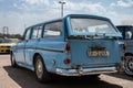 Blue Volvo Amazon classic car parked on the street