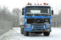 Blue Volvo F16 Truck in Snowfall