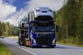 Blue Volvo FM Car Transporter Hauls New Cars