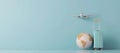A blue wall with a plane and a suitcase on it by AI generated image Royalty Free Stock Photo