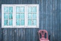 Blue wall with white window frame Royalty Free Stock Photo