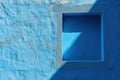 Blue Wall Window, Capturing Shadow and Texture for Calm Wall Art, and Interior Design Royalty Free Stock Photo