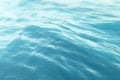 Blue water background with ripples, sea, ocean wave low angle view. Close-up Nature background. Hard focus with Royalty Free Stock Photo