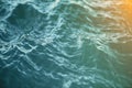 Blue water background with ripples, sea, ocean wave low angle view. Close-up Nature background. Soft focus with Royalty Free Stock Photo