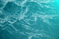 Blue water background with ripples, sea, ocean wave low angle view. Close-up Nature background. Soft focus with Royalty Free Stock Photo