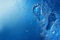 Blue water background with two footprints made of droplets Royalty Free Stock Photo
