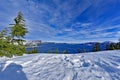 Blue Water Crater Lake with snow and cloud Royalty Free Stock Photo