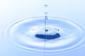 Blue water drop and splash background Royalty Free Stock Photo